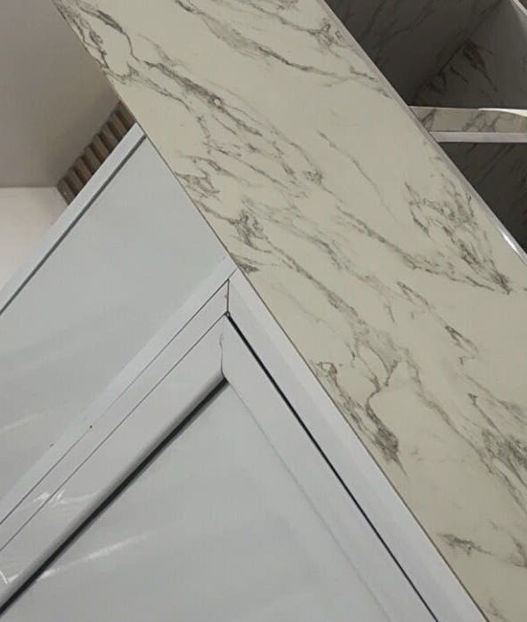 Modern marble display at Ruchicletus Beauty, Lagos, Lagos, NG, showcasing luxury beauty products.