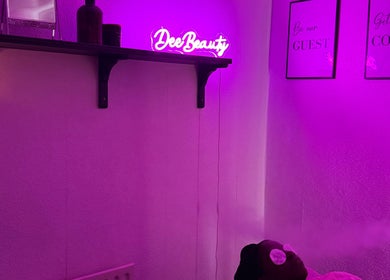 Spa room at Deebeauty in Ashton-under-lyne, England, GB with calming purple lighting and beauty treatments.