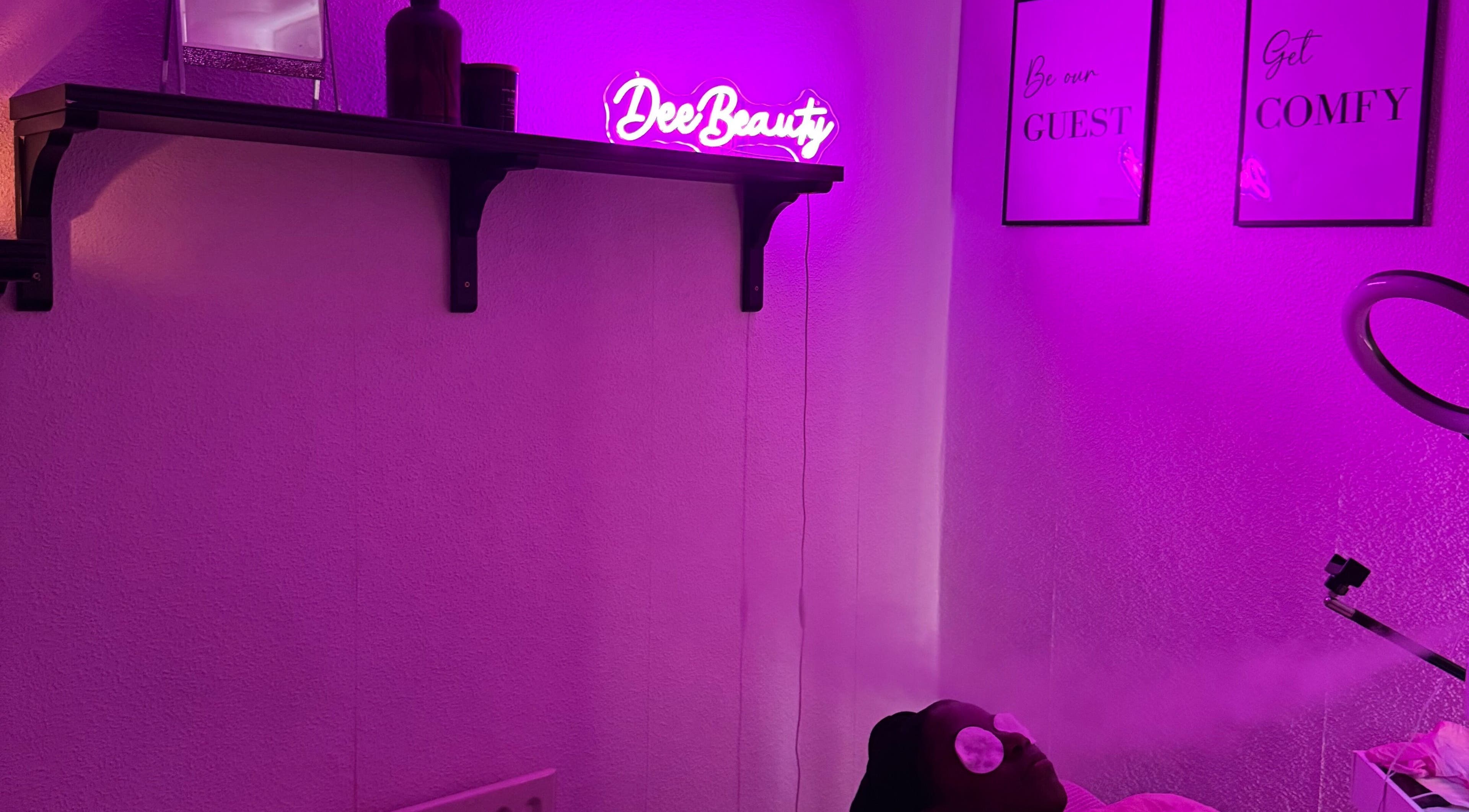 Spa room at Deebeauty in Ashton-under-lyne, England, GB with calming purple lighting and beauty treatments.