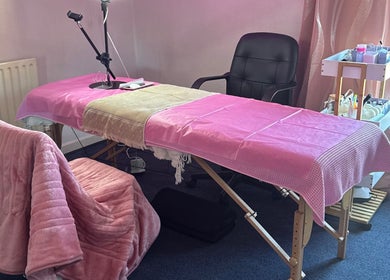 Deebeauty wellness treatment room with pink table and chair, Ashton-under-lyne, England, GB.