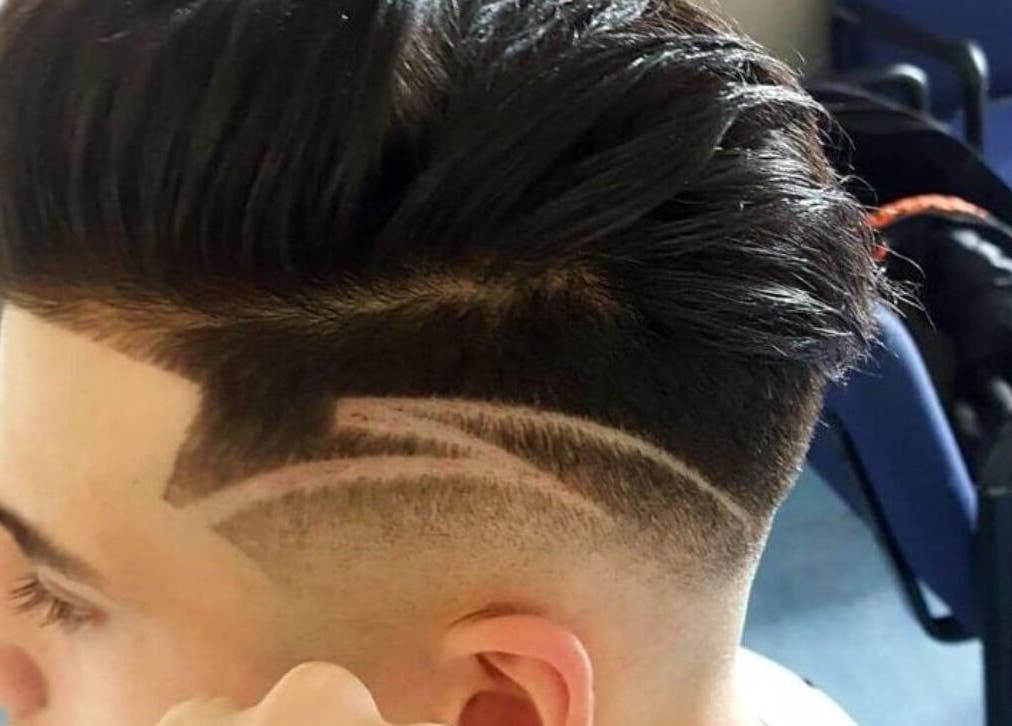 Trendy herenkapsel bij Joe Barbershop, Zwolle, Overijssel, NL. Strak design met moderne styling.