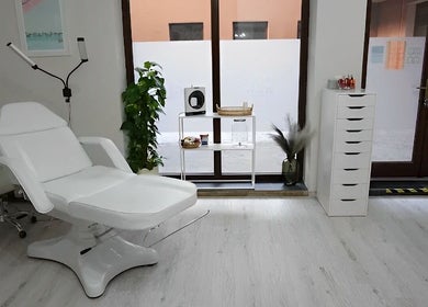 Relaxing treatment room at Bibi Beauty Studio, Košický Kraj, SK, featuring a plush white chair.