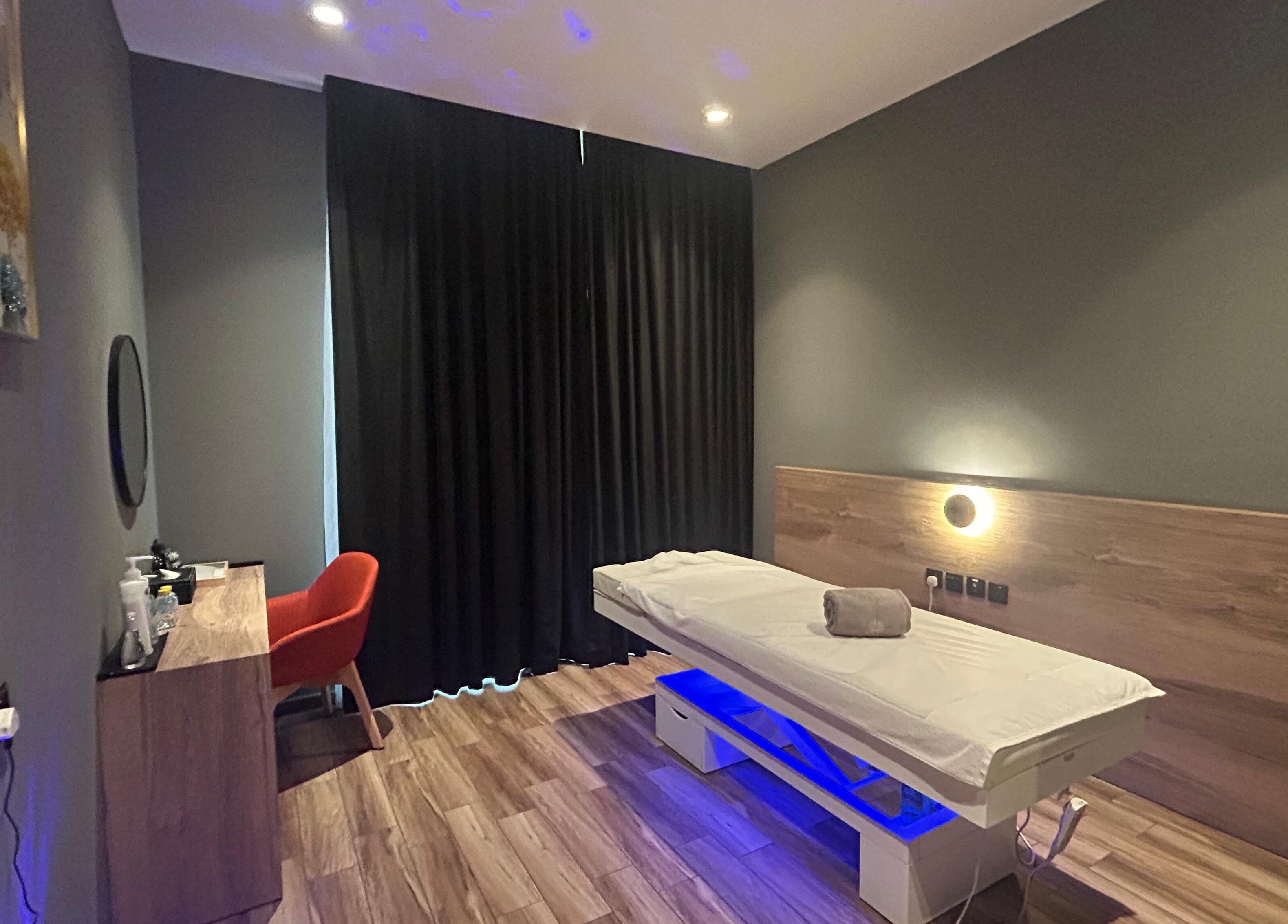 Cozy massage room at Euphoria Massage Spa, Dubai, Dubai, AE with a massage bed and ambient lighting.