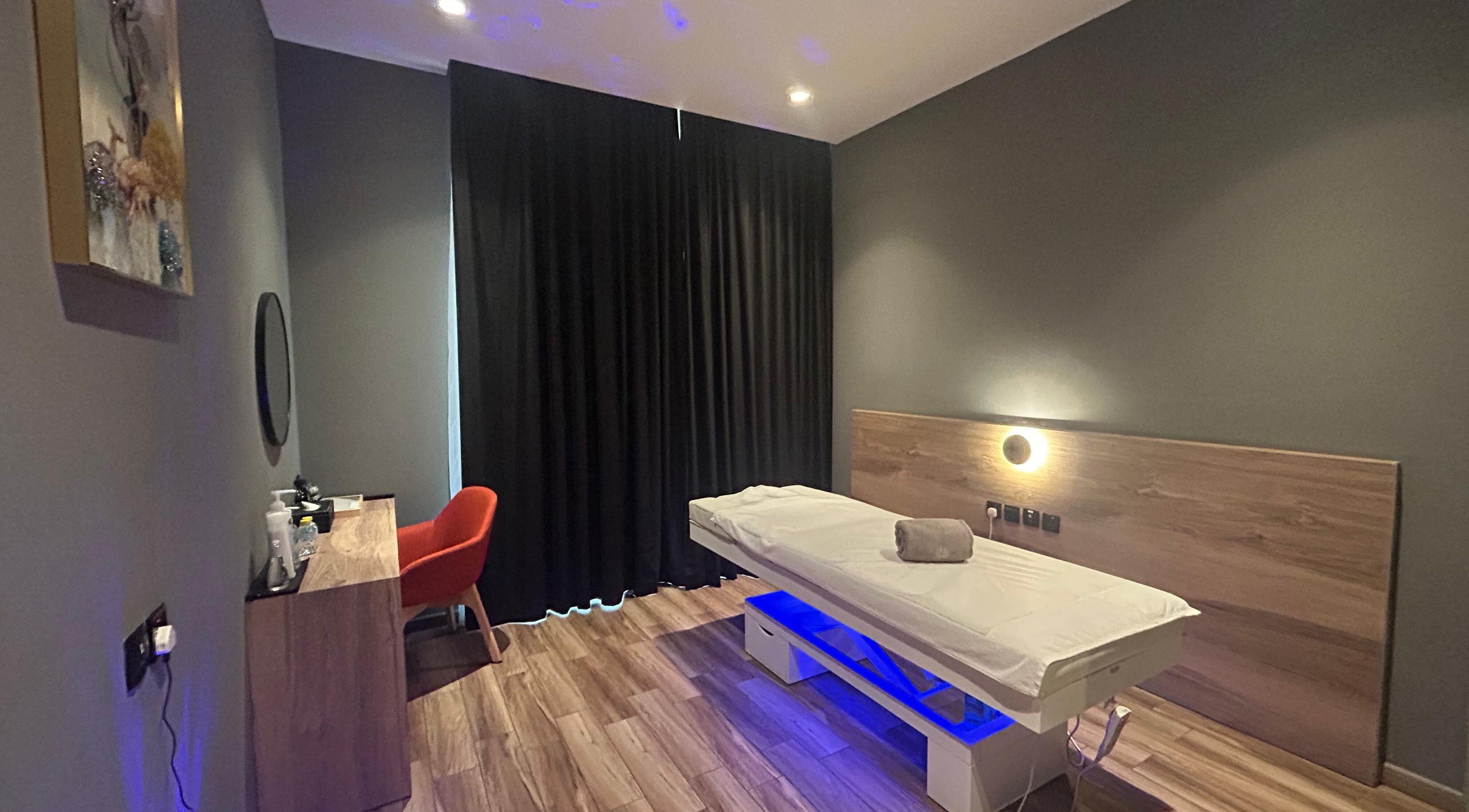 Cozy massage room at Euphoria Massage Spa, Dubai, Dubai, AE with a massage bed and ambient lighting.