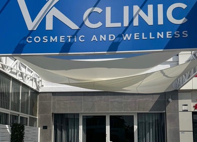 VK Cosmetic & Wellness Clinic entrance with bold signage in Alicante, Comunidad Valenciana, ES.
