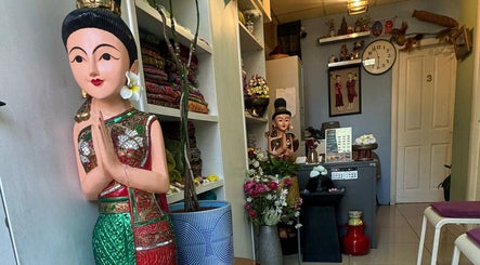 Elegant Thai decor welcomes guests at Karaket Thai Massage, London, England, GB, offering serene wellness experiences.