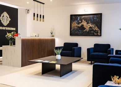 Stylish reception area at The Makeover Clinic, Birmingham, England, GB featuring modern decor and seating.
