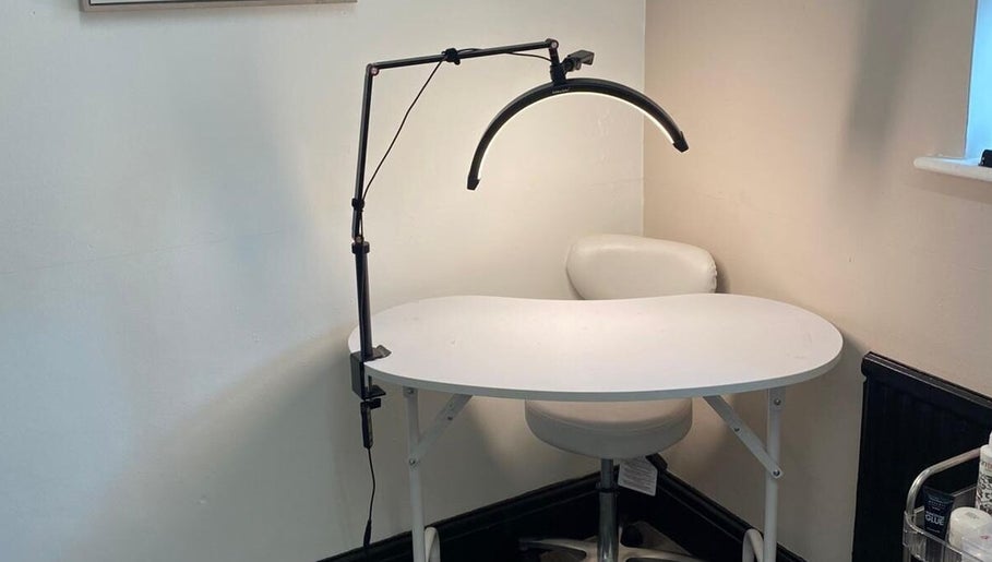 Elegant nail workstation with modern lighting at She'la's in Hasland, England, GB.