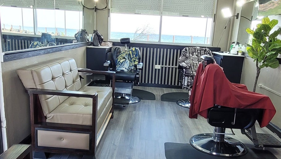 The Groom Lounge in Scarborough, Tobago offers a plush seating area with seaside views.
