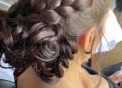 Elegant braided updo hairstyle at Halo Mobile Hair & Make-up, Kingston, Ontario, CA.