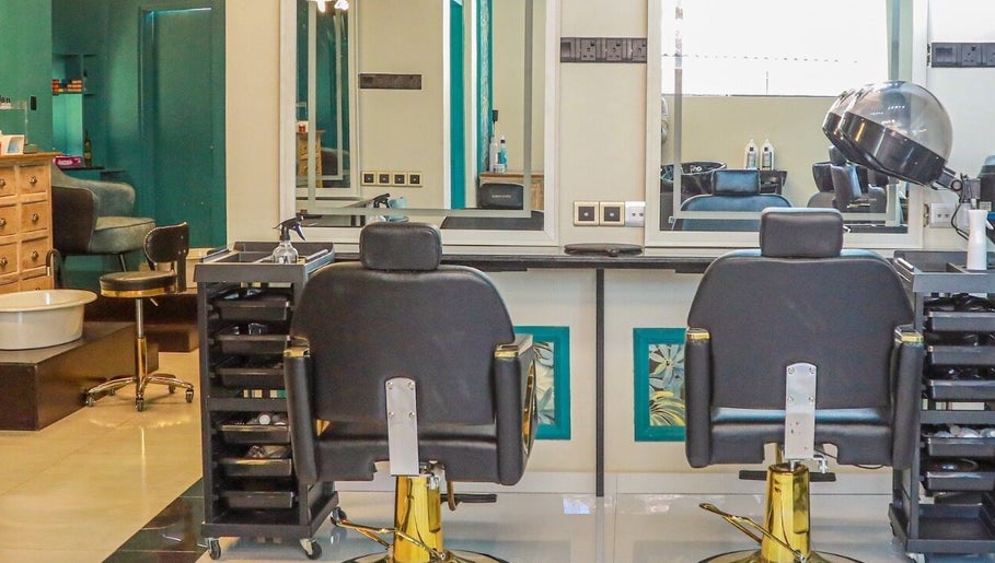 Sleek salon chairs and mirrors at Aurum Studio, Sri Jayawardenepura Kotte, Western Province, LK.