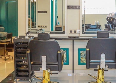 Sleek salon chairs and mirrors at Aurum Studio, Sri Jayawardenepura Kotte, Western Province, LK.