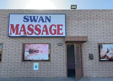 Entrance of Swan Massage with signage, located at 1480 in Yuma, Arizona, US.