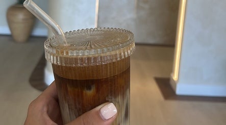 Chic iced latte at Ellie Barrow Beauty, Sunderland, England, GB, showcasing serene ambiance.