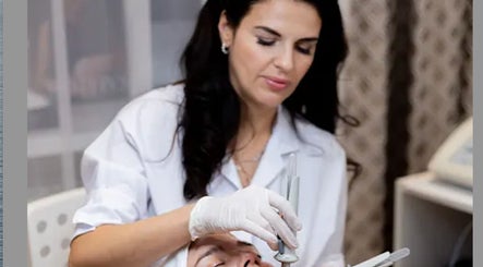 Skilled aesthetician performing a facial at Luminous Lux in West Hartford, Connecticut, US.