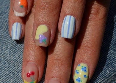 Colorful nail art design at The Tipsy Pixie, Roodepoort, Gauteng, ZA, showcasing vibrant creativity.
