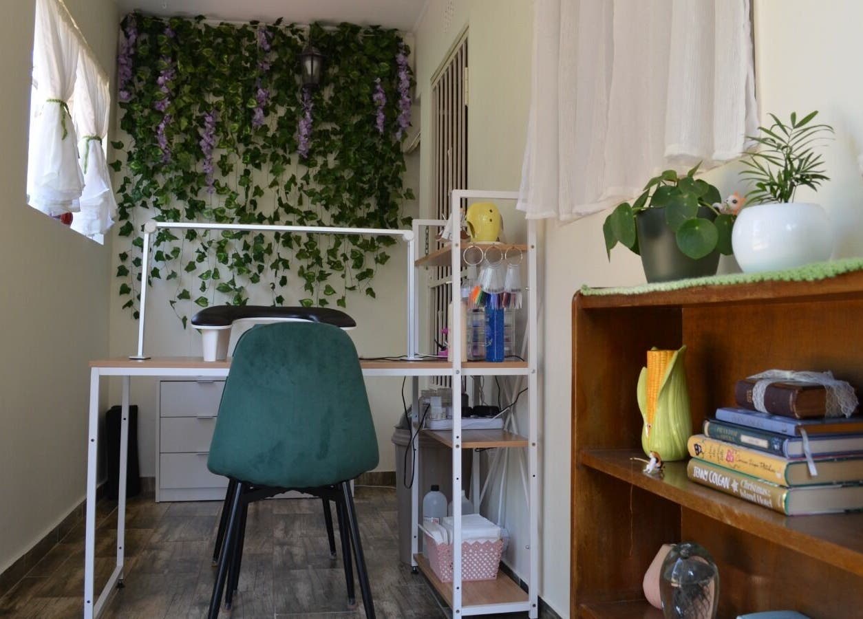 Elegant workspace with greenery at The Tipsy Pixie in Roodepoort, Gauteng, ZA, perfect for relaxation.