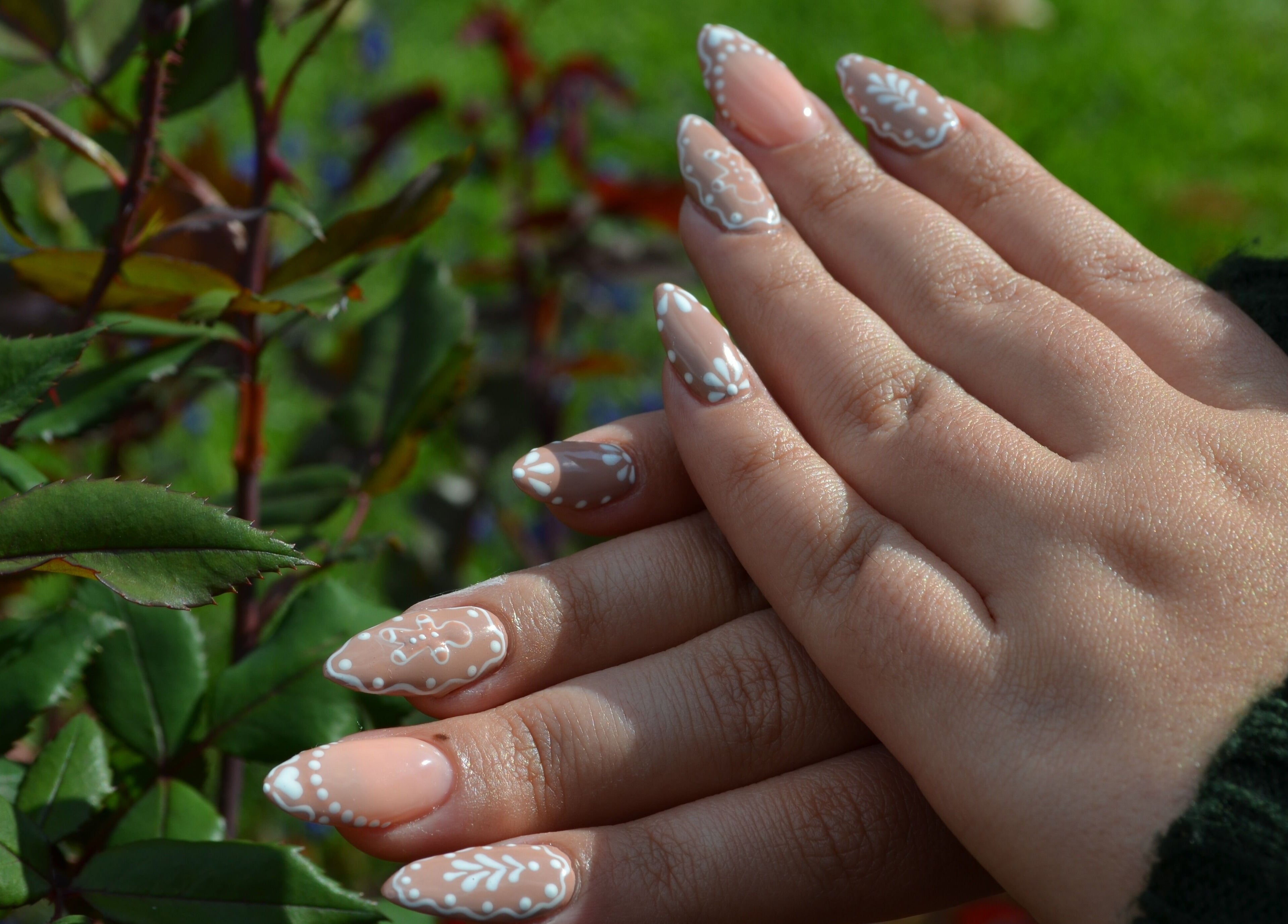 Intricate floral nails at The Tipsy Pixie, Roodepoort, Gauteng, ZA. Perfect manicure art in a lush garden setting.