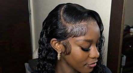 Close-up of a sleek hairstyle at The Lace Boss, Philipsburg, [no Name], SX, showcasing expert design.