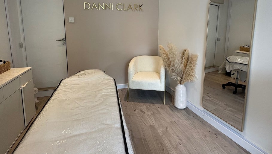 Treatment room at Danni Clark Beauty, Bognor Regis, England, GB with elegant decor and a massage table.