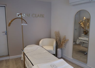 Elegant treatment room at Danni Clark Beauty, Bognor Regis, England, GB showcasing a cozy chair and stylish decor.