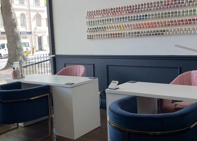 Chic manicure stations at Nails By Kendall in Doncaster, England, GB with vibrant nail polish display.
