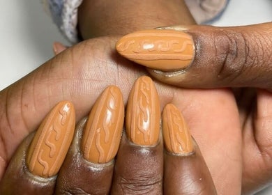 Close-up of stylish nail art at QNails in Randburg, Gauteng, ZA showcasing intricate designs.