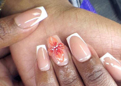 Floral nail art with French tips at NailsbyQ, Randburg, Gauteng, ZA.
