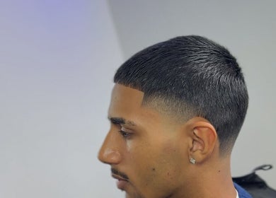 Close-up of a sleek haircut at Angelcuutzz in Jordbro, Stockholms Län, SE, showcasing a modern fade style.