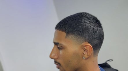 Close-up of a sleek haircut at Angelcuutzz in Jordbro, Stockholms Län, SE, showcasing a modern fade style.