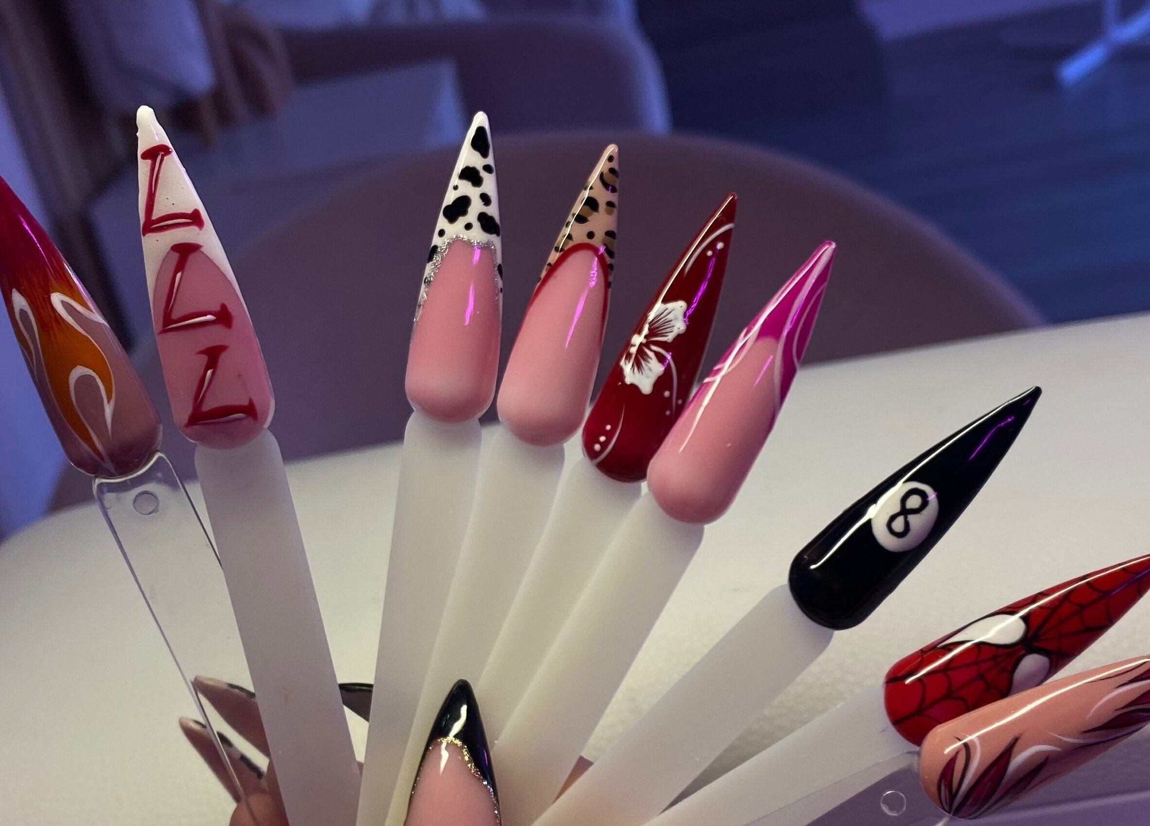 Decorative nail designs at Ink and Polish, Barnsley, England, GB, showcasing diverse artistry.