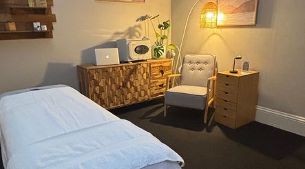 Relaxing massage room at Choojai Thai Massage, Richmond, Victoria, AU, featuring soothing decor.