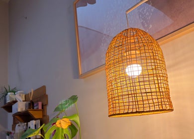Warm, woven lamp creating ambiance at Choojai Thai Massage, Richmond, Victoria, AU.