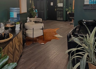 Stylishly designed waiting area at Elegant Aesthetics, Calgary, Alberta, CA, featuring modern decor and seating.