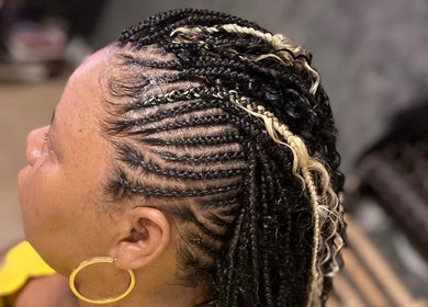 Beautiful braided hairstyle at Crownedbyexperience, Chicago, Illinois, US.