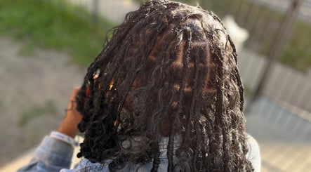 Intricate braiding style at Crownedbyexperience in Chicago, Illinois, US. Beautiful and detailed hair design.