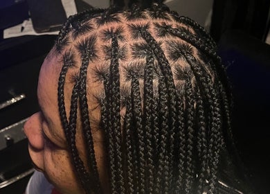 Intricate braids styled at Crownedbyexperience in Chicago, Illinois, US. A showcase of expert craftsmanship.