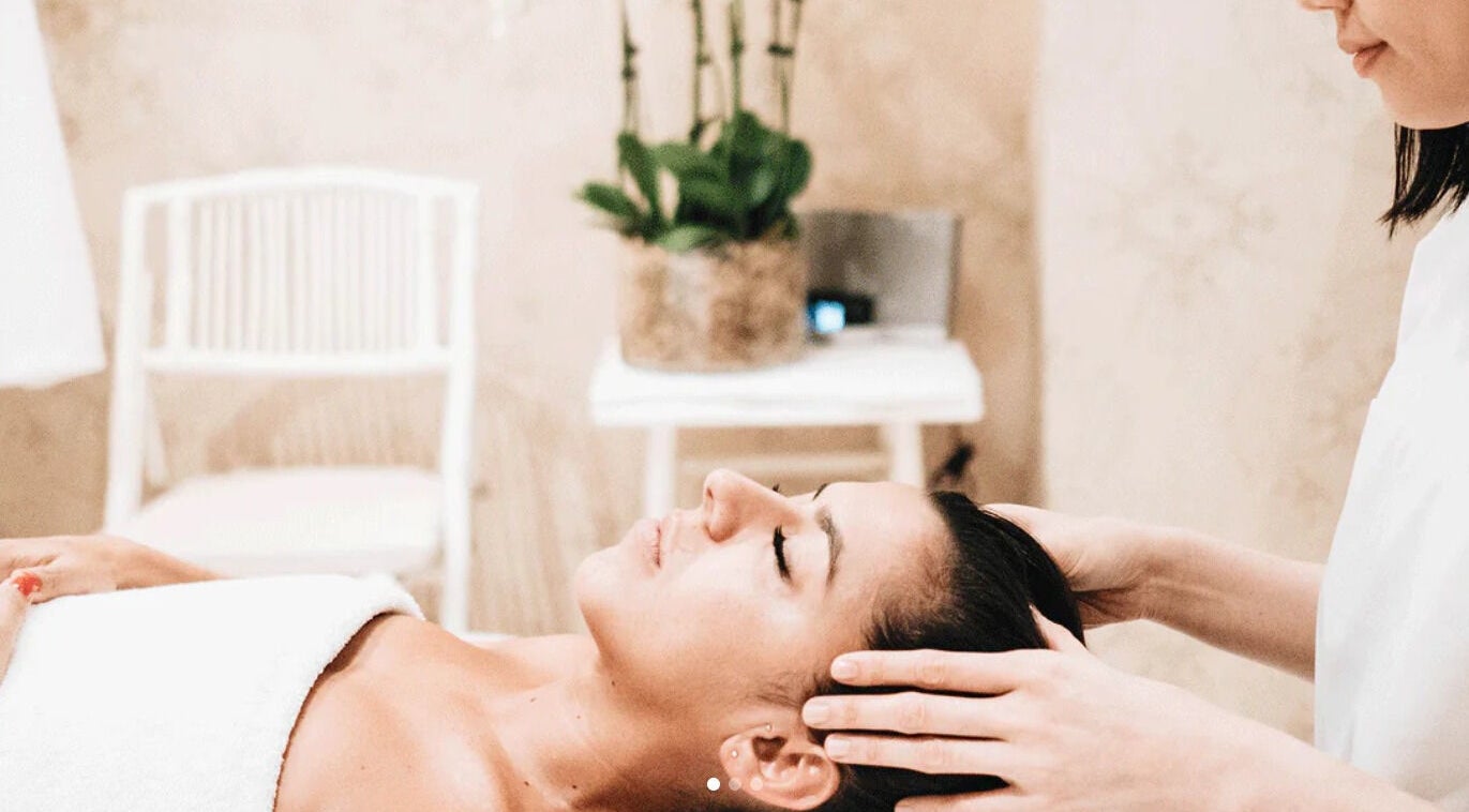 Relaxing head massage at Door Number 18 Day Spa, Sydney, New South Wales, AU. Expert care in a serene setting.