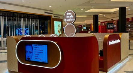 Brow Threads & Lashes Tea Tree Plaza venue in Modbury, South Australia, AU featuring illuminated signage.