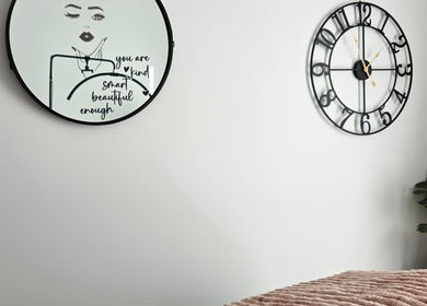 Stylish wall mirrors and clock at Courtney's Classics, Melbourne, Victoria, AU.