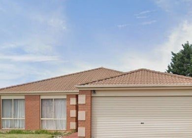 Front view of Courtney's Classics in Melbourne, Victoria, AU with brick exterior and lush surroundings.