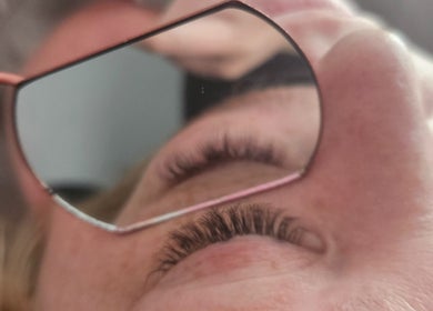 Close-up of eyelashes in mirror at Courtney's Dreamy Lashes, Melbourne, Victoria, AU.