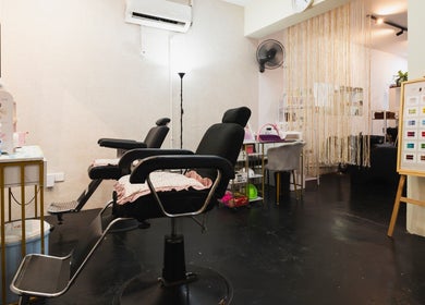 Modern interior of Bliss Salon in Kuala Lumpur, Wilayah Persekutuan Kuala Lumpur, MY, featuring styling chairs and decor.