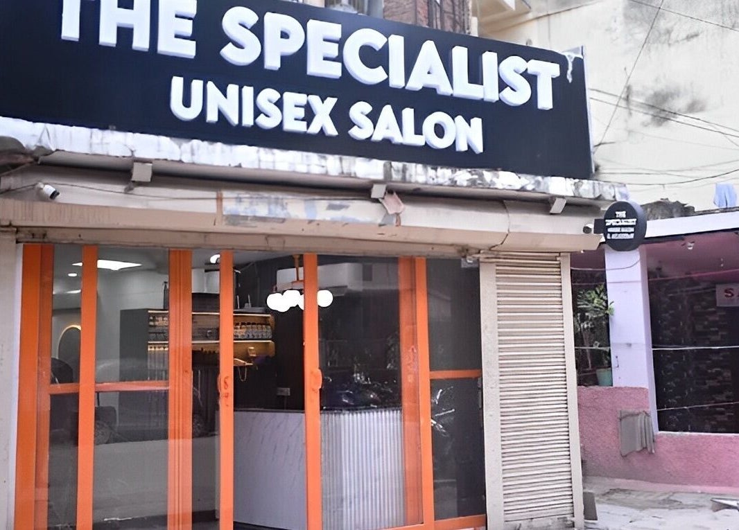 Front view of The Specialist Unisex Salon in New Delhi, Delhi, IN showcasing its inviting entrance.