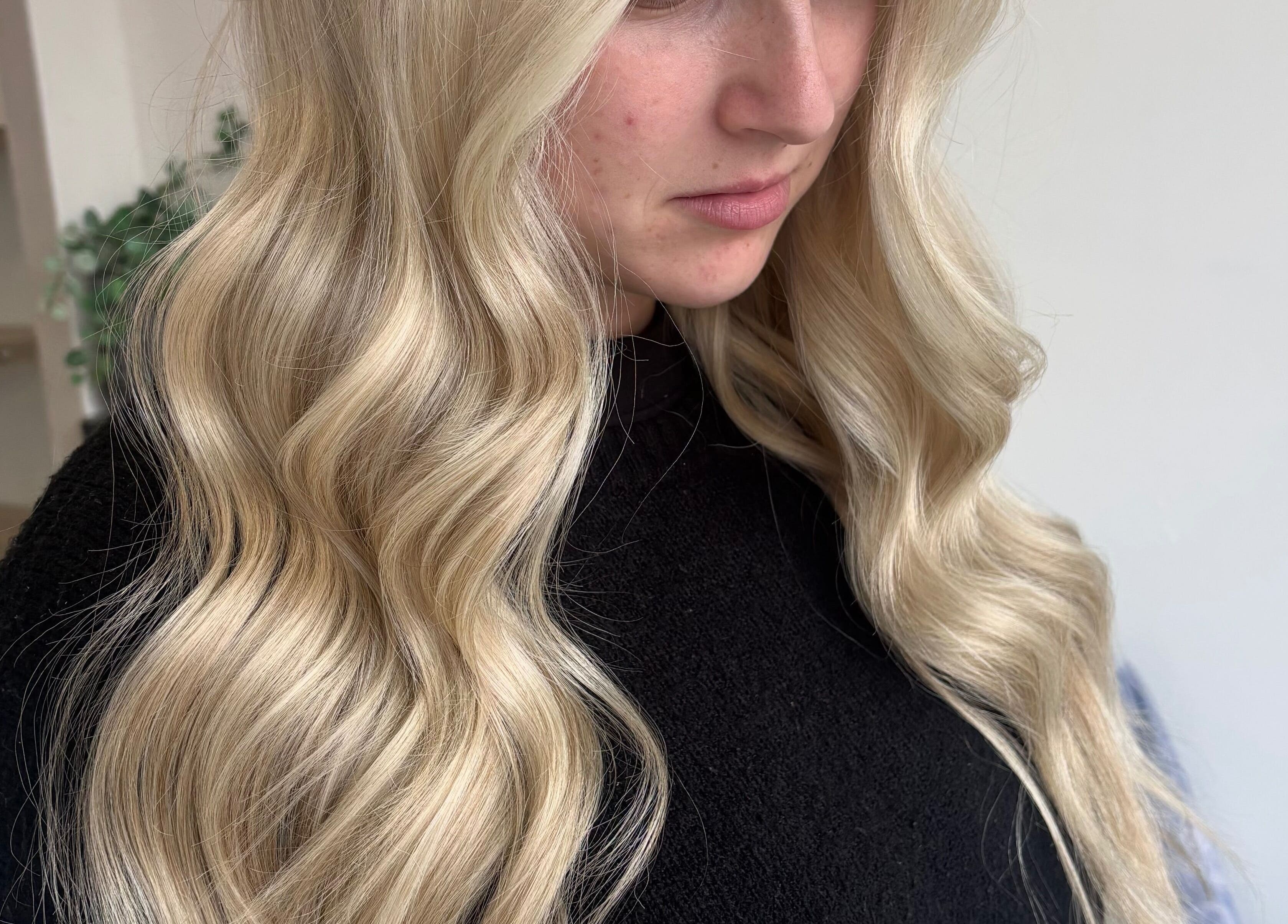 Blonde wavy hairstyle at Hair by Emma Sturt, Beenleigh, Queensland, AU.