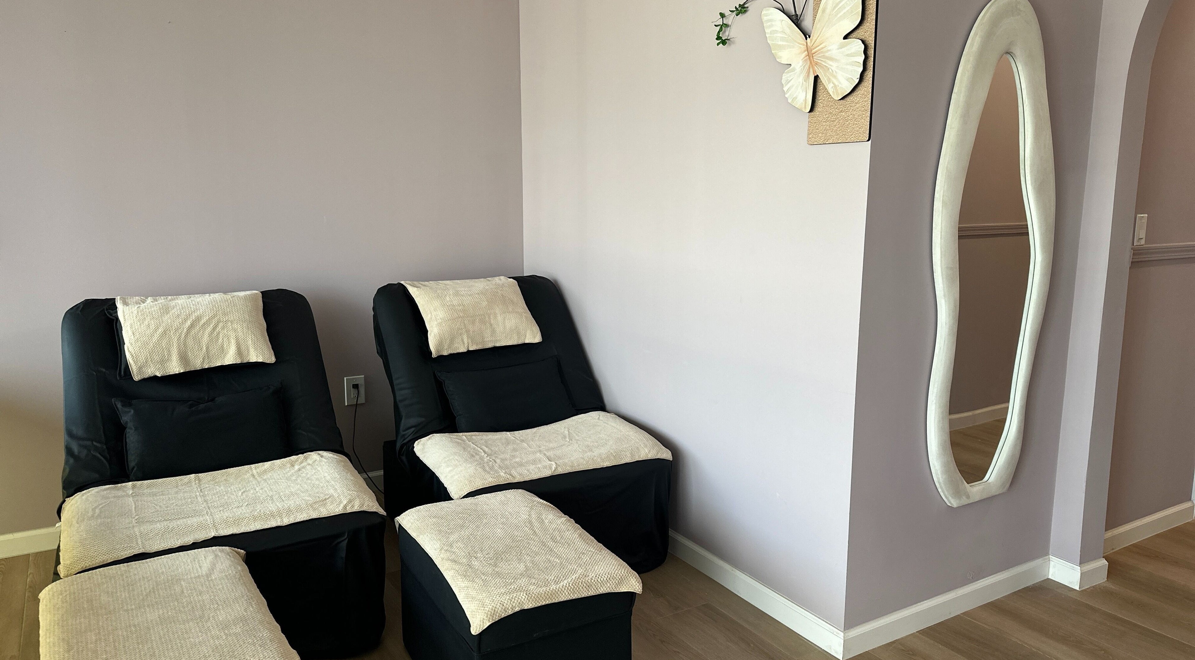 Cozy massage chairs at U Mi Massage in Lenoir City, Tennessee, US, with calming decor and ambiance.