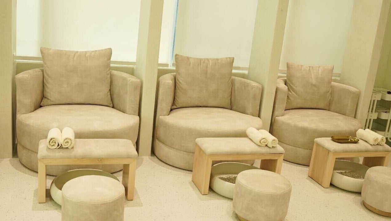 Plush seating for relaxation at Couture Studio, Taguig, Metro Manila, PH. A serene wellness experience.