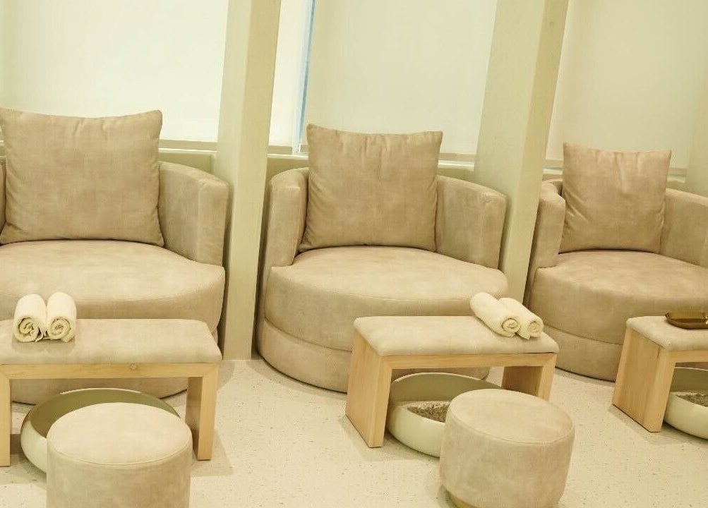Plush seating for relaxation at Couture Studio, Taguig, Metro Manila, PH. A serene wellness experience.