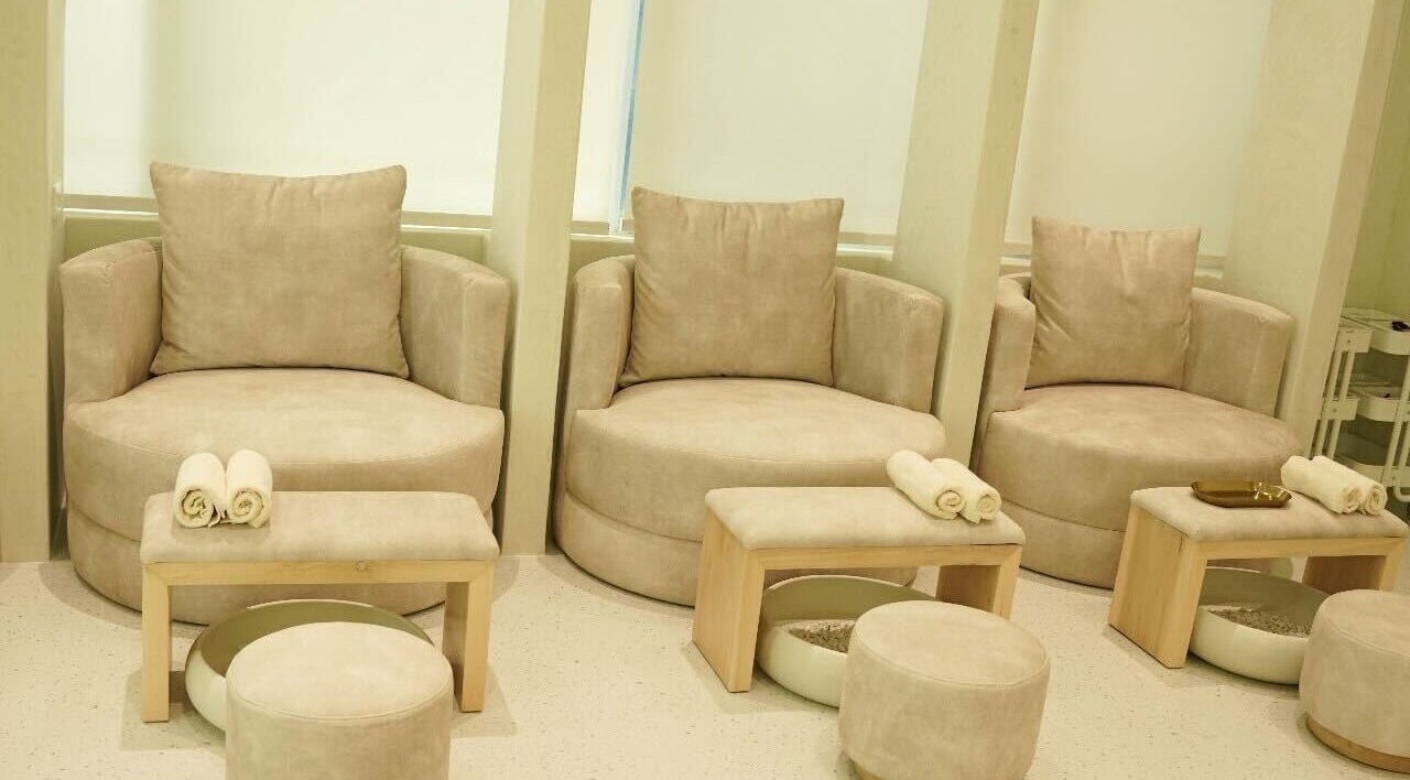Plush seating for relaxation at Couture Studio, Taguig, Metro Manila, PH. A serene wellness experience.