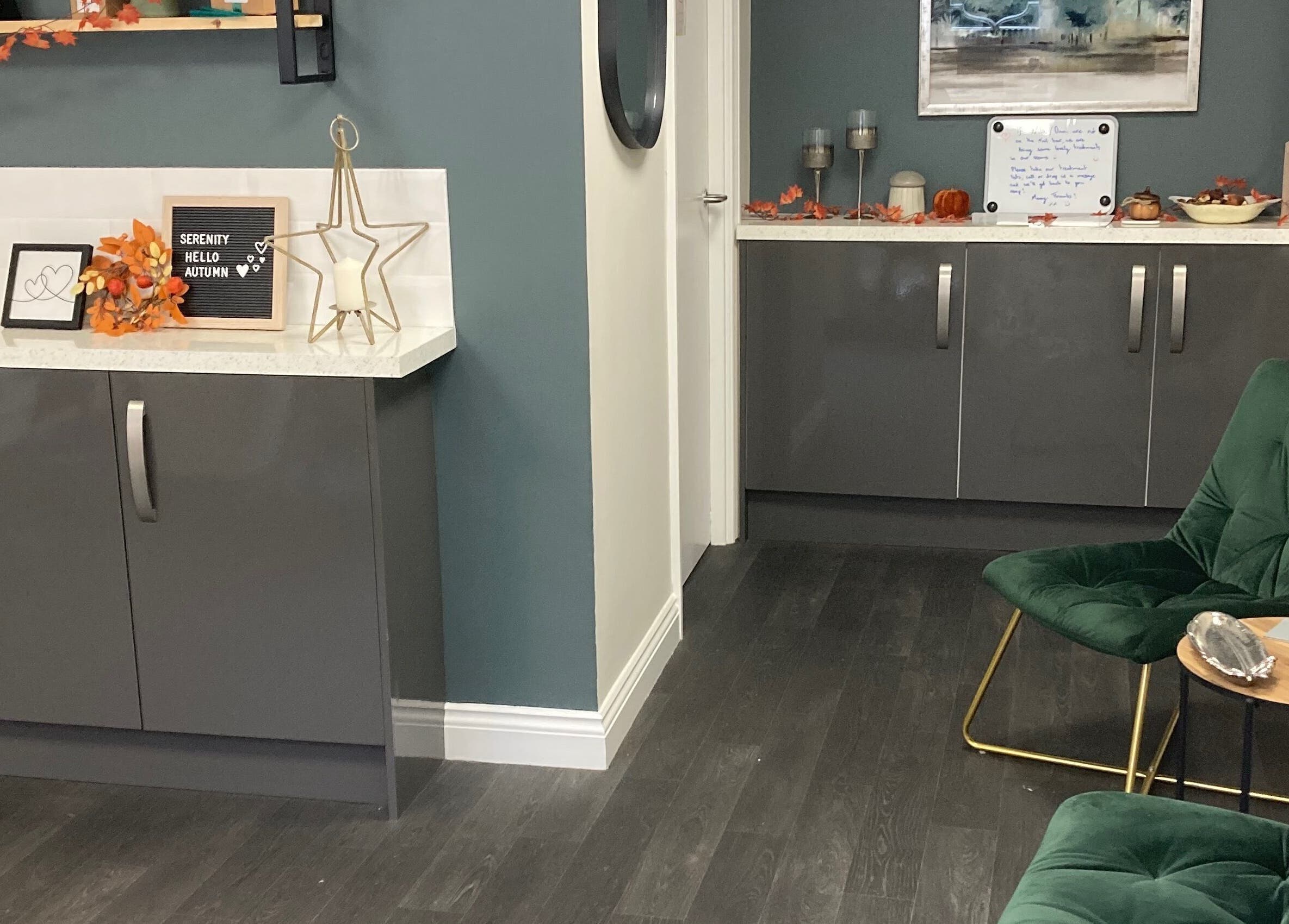 Cozy interior of Bliss & Beauty by Nikki at Serenity in Leek, England, GB, with autumn decor and modern furnishings.